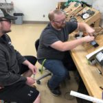 Ashton Chestnut learning to install and operate a motor controls transformer circuit with Mr. Karr.